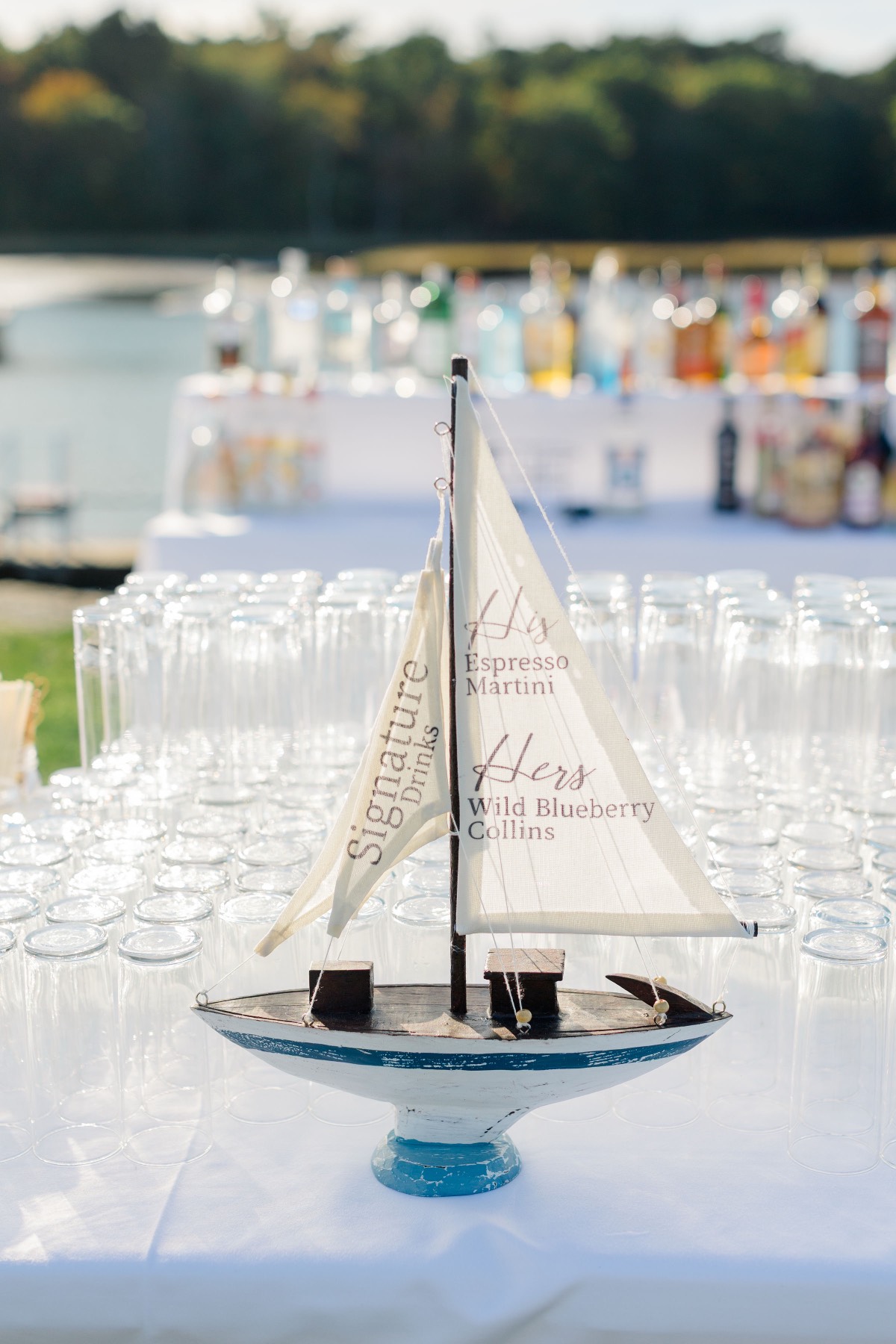 Handcrafted sailboat signature drinks sign for coastal beach weddings — Shoreline Bride Boston